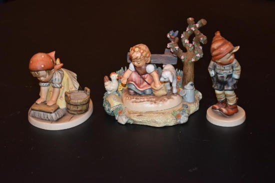 Three Hummel figurines