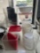 table lot of storage containers