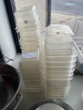 4 stacks of assorted pans