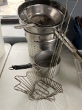 table lot of misc. strainers