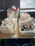 4 tubs misc. containers