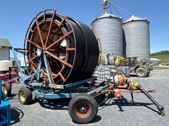 Long irrigation reel with gun and gun cart with 1300 feet of irrigation hose 3.75 inch inside