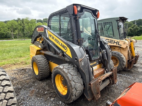 New Holland, L228 skid steer with 5982 hours auxiliary hydraulics foot control, heat and AC ,2 Sp...