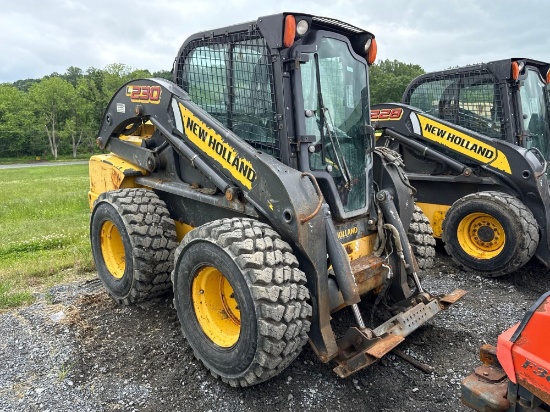 New Holland L230 skid steer with 1539 hrs ,foot controls, aux. hyd, heat & AC 4 new tires, 2 speed
