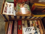 (6) boxes of paperback romance novels