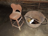 Old metal kettle, metal stool