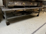 STAINLESS STEEL TABLE ON WHEELS