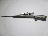 Remington .223 bolt repeating M700 stainless fluted barrel, lam thumb hole