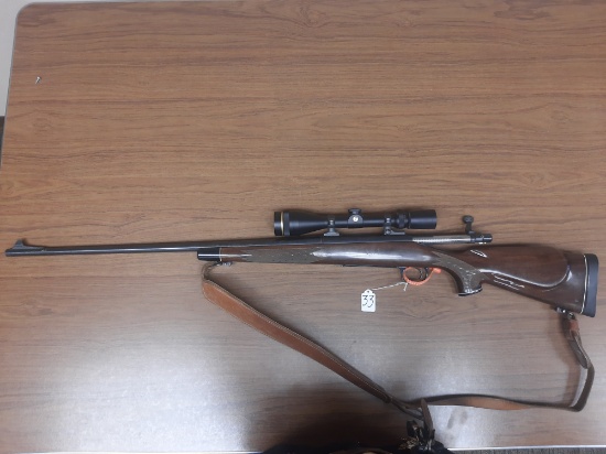 Remington Model 700 .300 Win Ultra Mag w/Leupold scope & leather sling SN G