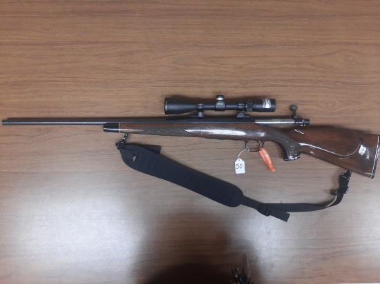 Remington 700 .270 caliber w/Nikon scope & black sling SN G6408541