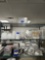 3 rows of square containers, lids, misc