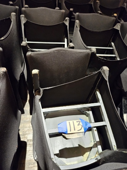 26)black wood chairs w/black covers