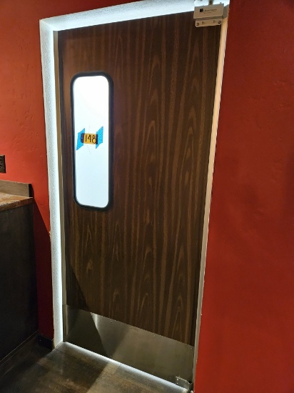 swinging kitchen traffic door