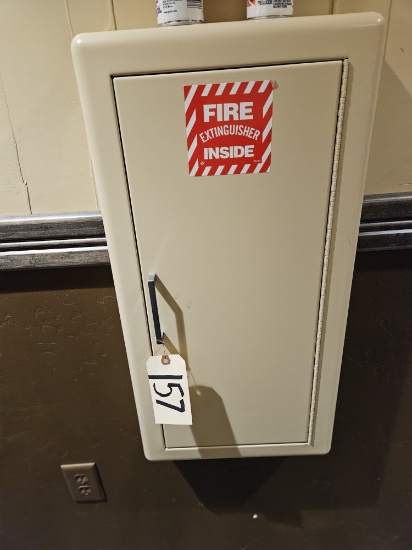 fire extinguisher in beige metal wall mount case