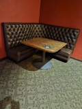 tufted back brown corner booth w/wood table