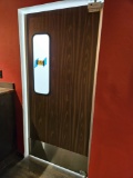 swinging kitchen traffic door