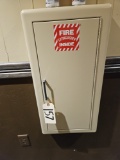 fire extinguisher in beige metal wall mount case