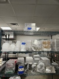 3 rows of square containers, lids, misc