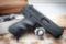 Hi Point model C9, 9 mm pistol with a box and 3 mags, serial number P1486854