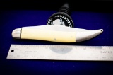 Case model 32095, Smooth Yellow synthetic handles with 4 in fishing knife and 4 in scaler
