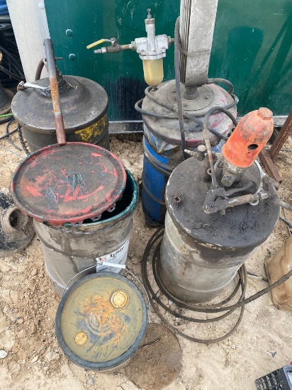 4 Grease cans with pumps & tractor oil