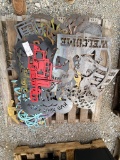 Pallet of metal artwork signs