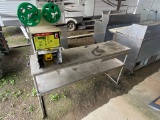 Stainless table with film machine