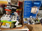 2 boxes of lights,calk gun & exterior light