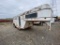 1986 24' Sundowner 3 horse slant trailer