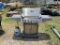Blue Ember gas Grill with propane bottle