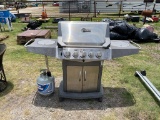 Blue Ember gas Grill with propane bottle