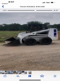 Bobcat 743B has 1079 hours runs and operates