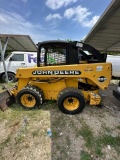 John Deere 260  2 speed High flow Skid steer has a small oil leak 1569 runs and moves