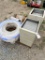 Pallet of water line and filing cabinet