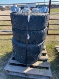 4-Ford 8 lug wheels & tires with caps