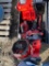 Crate of Milwaukee power tools