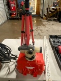 Surveyor with tripod stand