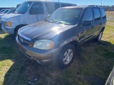 2003 Mazda Tribute runs & drives vin#4488, power stirring leaks clean title