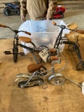 Box of Metal Antique Bikes