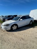 2010 Chevy Impala 4 Door 128K Miles runs & drives has exhaust leak, clean title