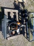 New Wolverine mini skid quick attach auger