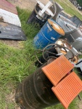 4-50 Gallon Barrels with 2 barrels Dollys