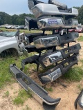 Rack full of rear bumpers