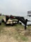 20' GN Low Boy Tandem 7K Axles New Floor,sliding ramps has title
