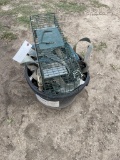Bucket of straps and ratchets, varment trap