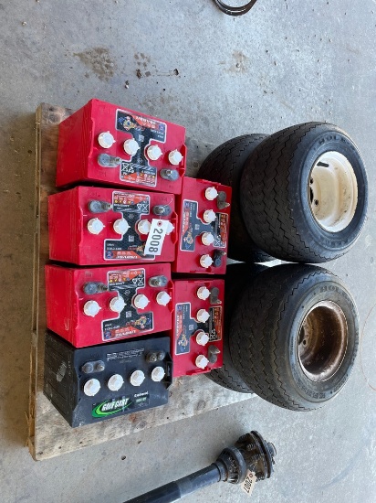 Pallet of 6 batteries,4 golf cart wheels & tires