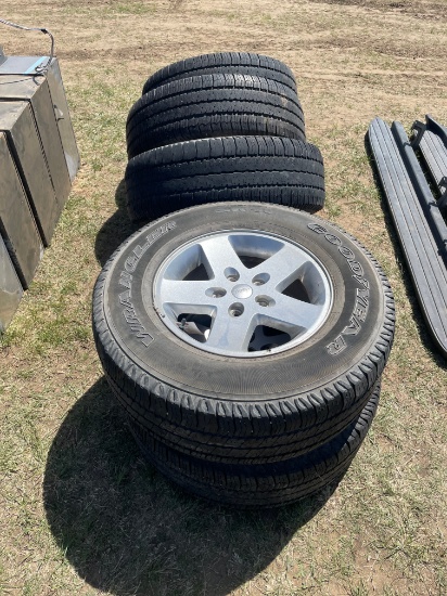 Set of 5 Jeep wheels & tires with goodyear wrangle tires