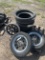 Pallet of motorcycle tires & two rims with tires