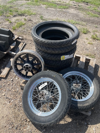 Pallet of motorcycle tires & two rims with tires