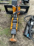 Skid steer post driver